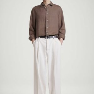 PLEATED WIDE-LEG DENIM PANTS